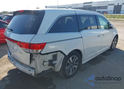 2016 Honda Odyssey Touring/Touring Elite z USA, uszkodzony, nr VIN 5FNRL5H90GB109066